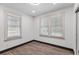 Bedroom with window blinds and wood-look flooring at 2514 Beach S Blvd, Gulfport, FL 33707