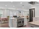 Open kitchen features island with cooktop and double oven at 2514 Beach S Blvd, Gulfport, FL 33707