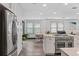 Open concept kitchen with stainless steel appliances at 2514 Beach S Blvd, Gulfport, FL 33707
