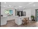 Modern kitchen with island and pool view at 2514 Beach S Blvd, Gulfport, FL 33707