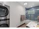 Laundry room with stacked washer and dryer at 2514 Beach S Blvd, Gulfport, FL 33707
