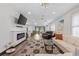 Spacious living room with a modern fireplace and comfortable seating at 2514 Beach S Blvd, Gulfport, FL 33707
