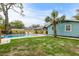 Inviting backyard oasis with a refreshing pool and patio furniture at 2514 Beach S Blvd, Gulfport, FL 33707