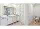Double vanity bathroom with walk-in shower at 13855 Richland Gulf Cir, Parrish, FL 34219