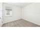Spacious bedroom with carpeted floor and window at 13855 Richland Gulf Cir, Parrish, FL 34219