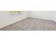 Well-lit bedroom featuring a window and carpeted floor at 13855 Richland Gulf Cir, Parrish, FL 34219