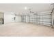 Spacious two-car garage with automatic door opener at 13855 Richland Gulf Cir, Parrish, FL 34219