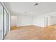 Living room with tile floors and access to other rooms at 13855 Richland Gulf Cir, Parrish, FL 34219