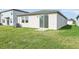 House backyard with grassy area at 14037 Crutchfield Ct, Parrish, FL 34219