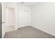 Bedroom with grey carpet and double door closet at 14037 Crutchfield Ct, Parrish, FL 34219