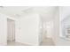 Bright and airy entryway with tile floors and neutral colors at 14037 Crutchfield Ct, Parrish, FL 34219