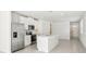 Modern kitchen with stainless steel appliances and an island at 14037 Crutchfield Ct, Parrish, FL 34219