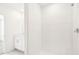 Large walk-in shower with white tile at 14037 Crutchfield Ct, Parrish, FL 34219