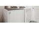 Laundry room with Whirlpool washer and dryer at 14057 Crutchfield Ct, Parrish, FL 34219