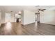 Spacious living room with hardwood floors and ceiling fan at 3531 Oxford Dr, Holiday, FL 34691