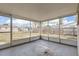 Spacious screened porch overlooking backyard at 3531 Oxford Dr, Holiday, FL 34691