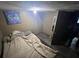 Small bedroom with a double bed and dark walls at 855 St Francis St, Brooksville, FL 34601