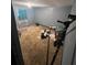 Second bedroom with brown carpet at 855 St Francis St, Brooksville, FL 34601