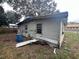 Back of house showing peeling paint at 855 St Francis St, Brooksville, FL 34601