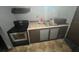 Small kitchen with simple countertops and appliances at 855 St Francis St, Brooksville, FL 34601