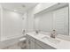 Bathroom with double vanity, tub, and tile floor at 13859 Richland Gulf Cir, Parrish, FL 34219