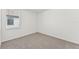 Spacious bedroom with carpeted floor and window at 13859 Richland Gulf Cir, Parrish, FL 34219
