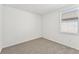 Spacious bedroom with carpeted floor and window at 13859 Richland Gulf Cir, Parrish, FL 34219
