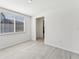 Bright dining room with tile floor and view into kitchen at 13859 Richland Gulf Cir, Parrish, FL 34219