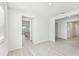 Light-filled hallway with views of kitchen and other rooms at 13859 Richland Gulf Cir, Parrish, FL 34219