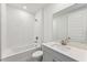 Clean bathroom with a bathtub and quartz countertop at 13868 Richland Gulf Cir, Parrish, FL 34219