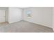 Bright bedroom with carpet flooring and neutral walls at 13868 Richland Gulf Cir, Parrish, FL 34219