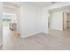 Bright entryway with tile floors and views into the kitchen and other rooms at 13868 Richland Gulf Cir, Parrish, FL 34219