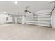 Two-car garage with automatic garage door at 13868 Richland Gulf Cir, Parrish, FL 34219