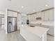 Kitchen features stainless steel appliances and a large island at 13868 Richland Gulf Cir, Parrish, FL 34219