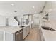 Modern kitchen with stainless steel appliances and an island at 13868 Richland Gulf Cir, Parrish, FL 34219