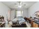 Bedroom with double bed, desk, and window at 1450 Ward St, North Port, FL 34288