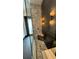 Spa-like shower with herringbone tile and built-in seat at 7801 9Th S Ave, St Petersburg, FL 33707