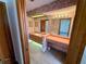 Double vanity bathroom with light brown cabinets at 12010 Villa Rd, Spring Hill, FL 34609