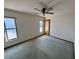 Spacious bedroom with neutral walls and carpet at 12010 Villa Rd, Spring Hill, FL 34609