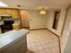 Kitchen with wood cabinets, black appliances and breakfast nook at 12010 Villa Rd, Spring Hill, FL 34609