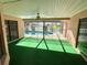 Relaxing pool area with covered patio and fenced pool at 12010 Villa Rd, Spring Hill, FL 34609