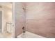 Clean bathroom with tiled shower and tub at 634 Newton S Ave, St Petersburg, FL 33701