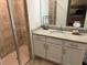 Clean bathroom with granite vanity and large shower at 43020 Greenway Blvd # 313, Punta Gorda, FL 33982