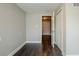 Bedroom with hardwood floors and access to other rooms at 4675 20Th S Ave, St Petersburg, FL 33711