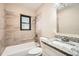 Updated bathroom with granite vanity and stylish tile at 6412 Skyline Ct, Spring Hill, FL 34606