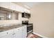 Renovated kitchen featuring granite countertops and stainless steel appliances at 6412 Skyline Ct, Spring Hill, FL 34606