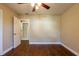 Spacious bedroom with hardwood floors and barn door at 6009 N 39Th St, Tampa, FL 33610