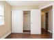 Bedroom with spacious closet and sliding doors at 6009 N 39Th St, Tampa, FL 33610
