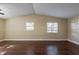 Living room with hardwood floors and large windows at 6009 N 39Th St, Tampa, FL 33610