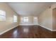Bright living room with hardwood floors and neutral walls at 6009 N 39Th St, Tampa, FL 33610
